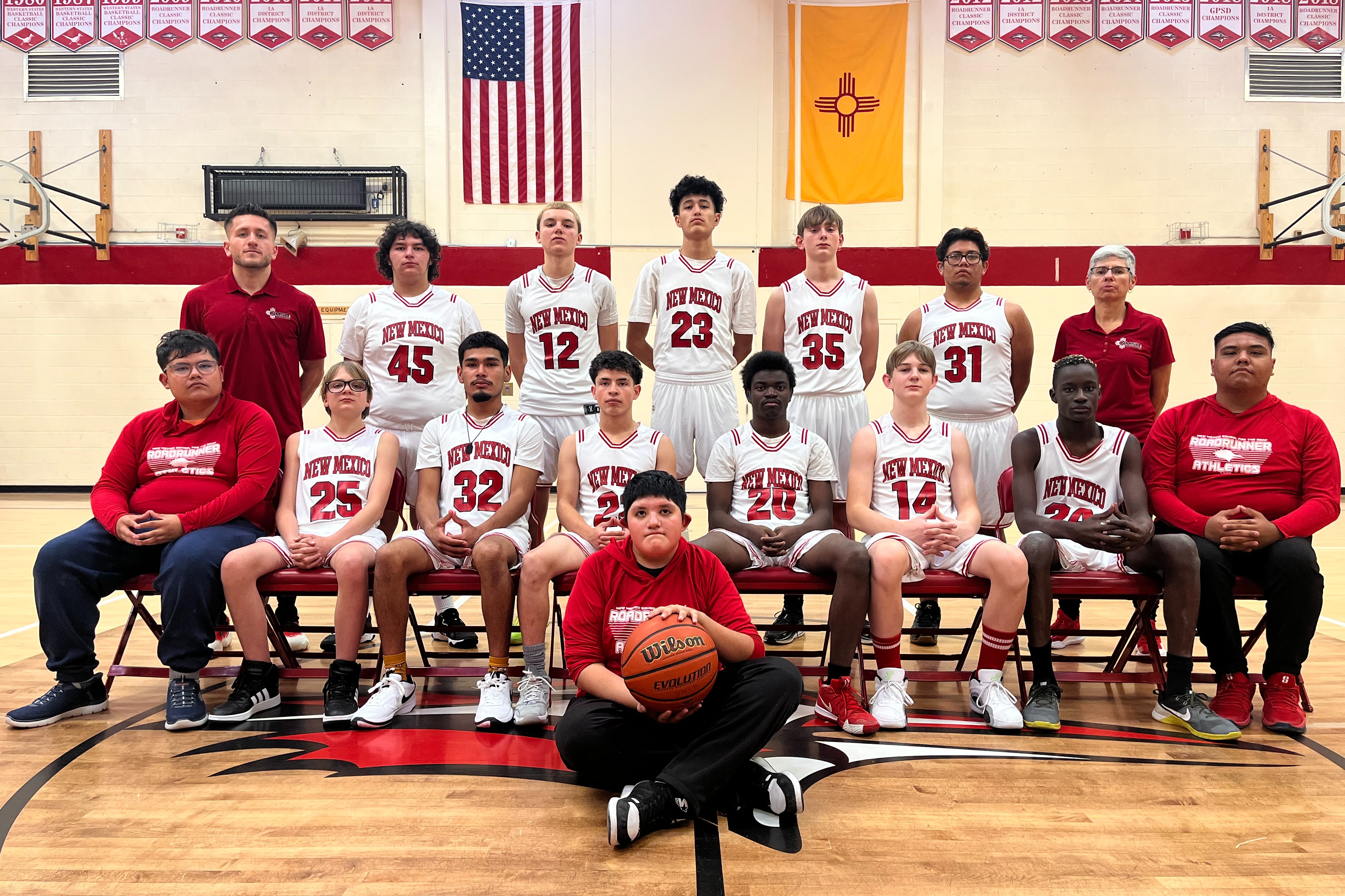 2024-2025 Varsity Boys Basketball Team with coaches