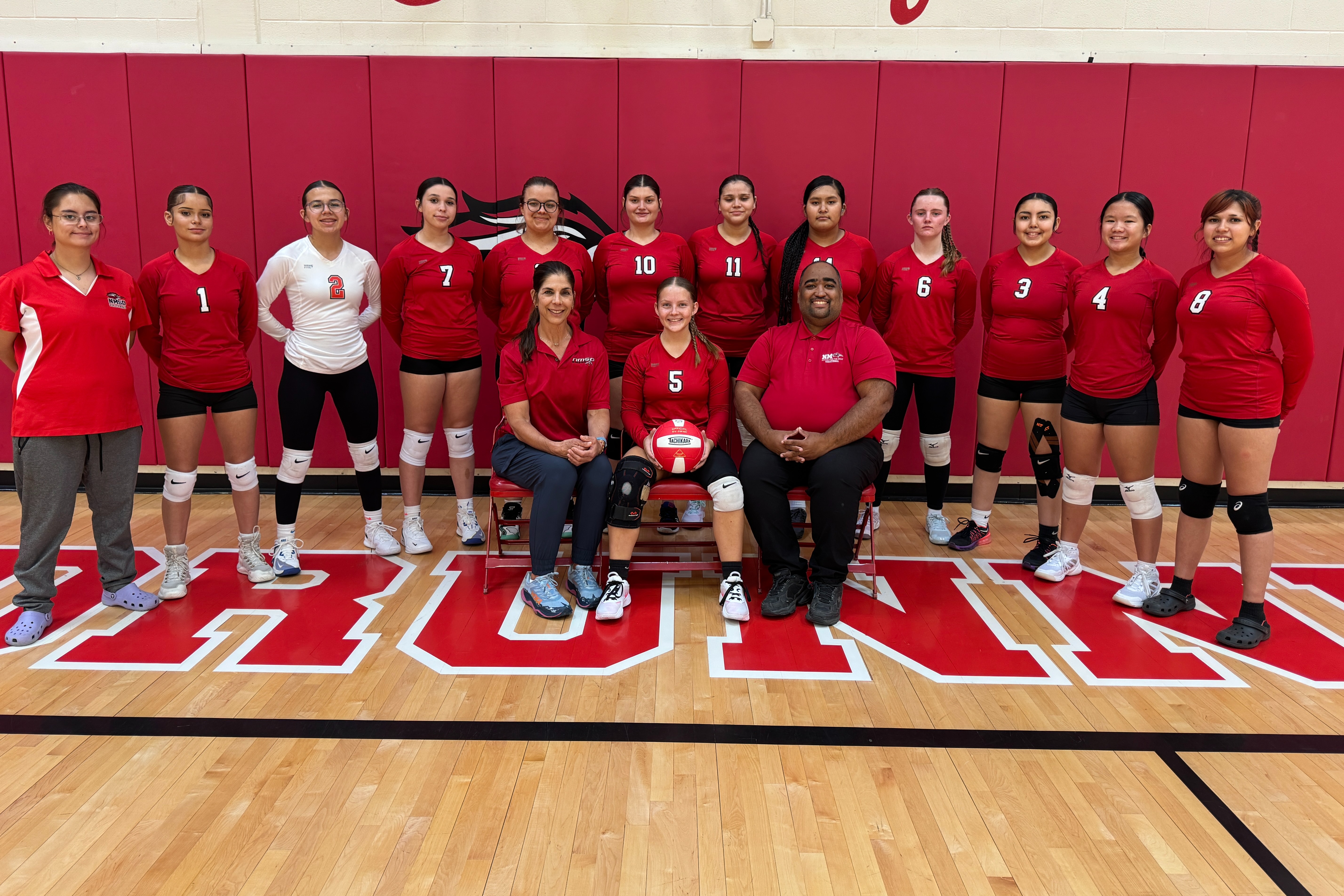 2025-2026 Varsity Volleyball  Team with coaches