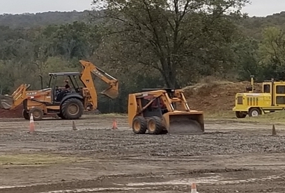 Backhoe and bulldozer on a worksite