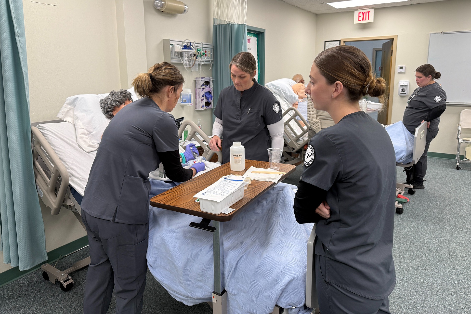 Nursing student practicing skills