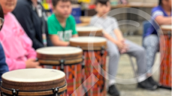 Students playing drums