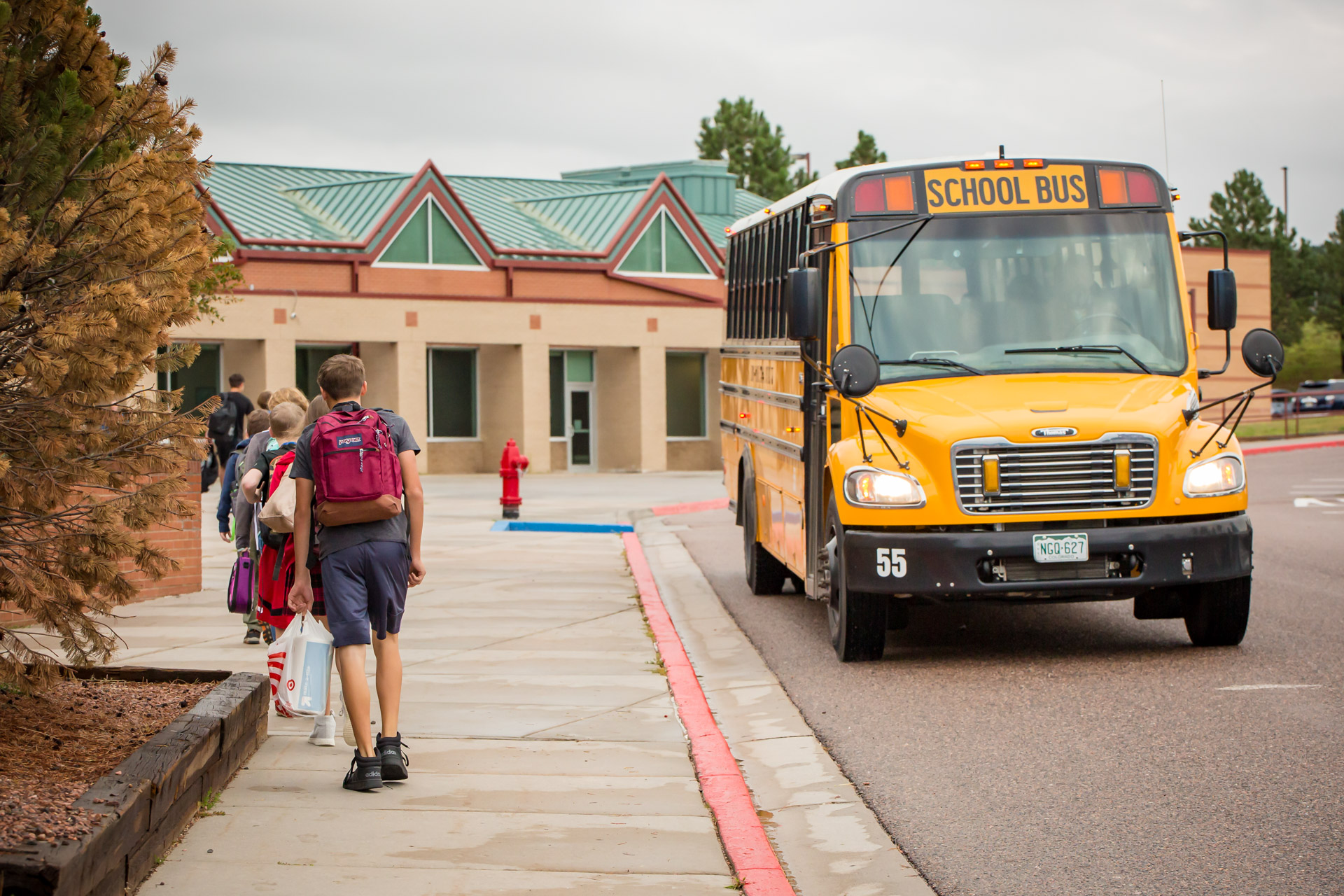 students walk into lewis-palmer middle on the first day of school