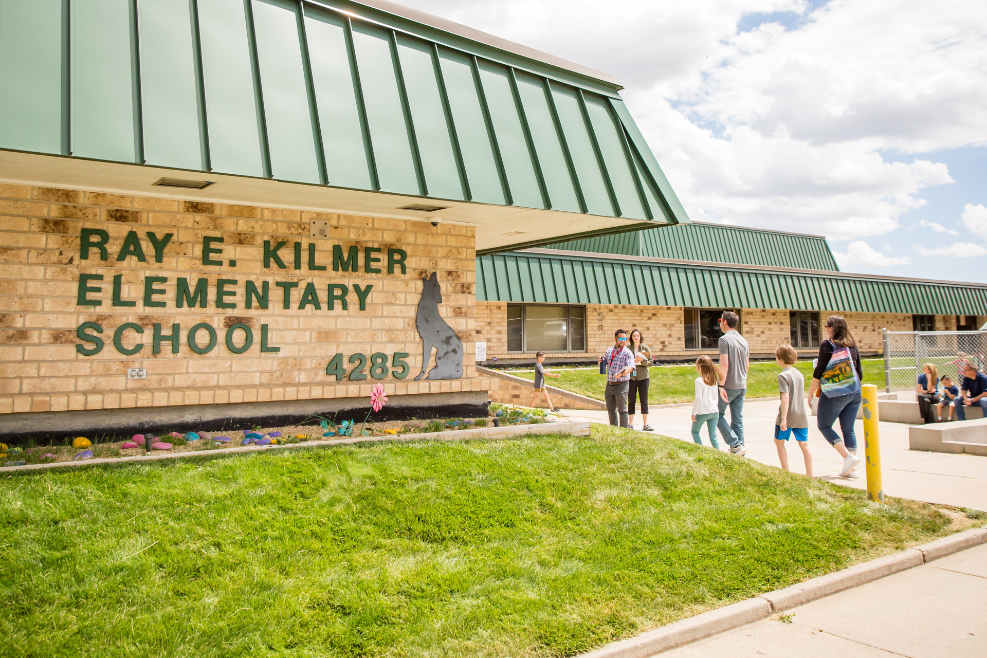 Families walk into RKES on the first day of school