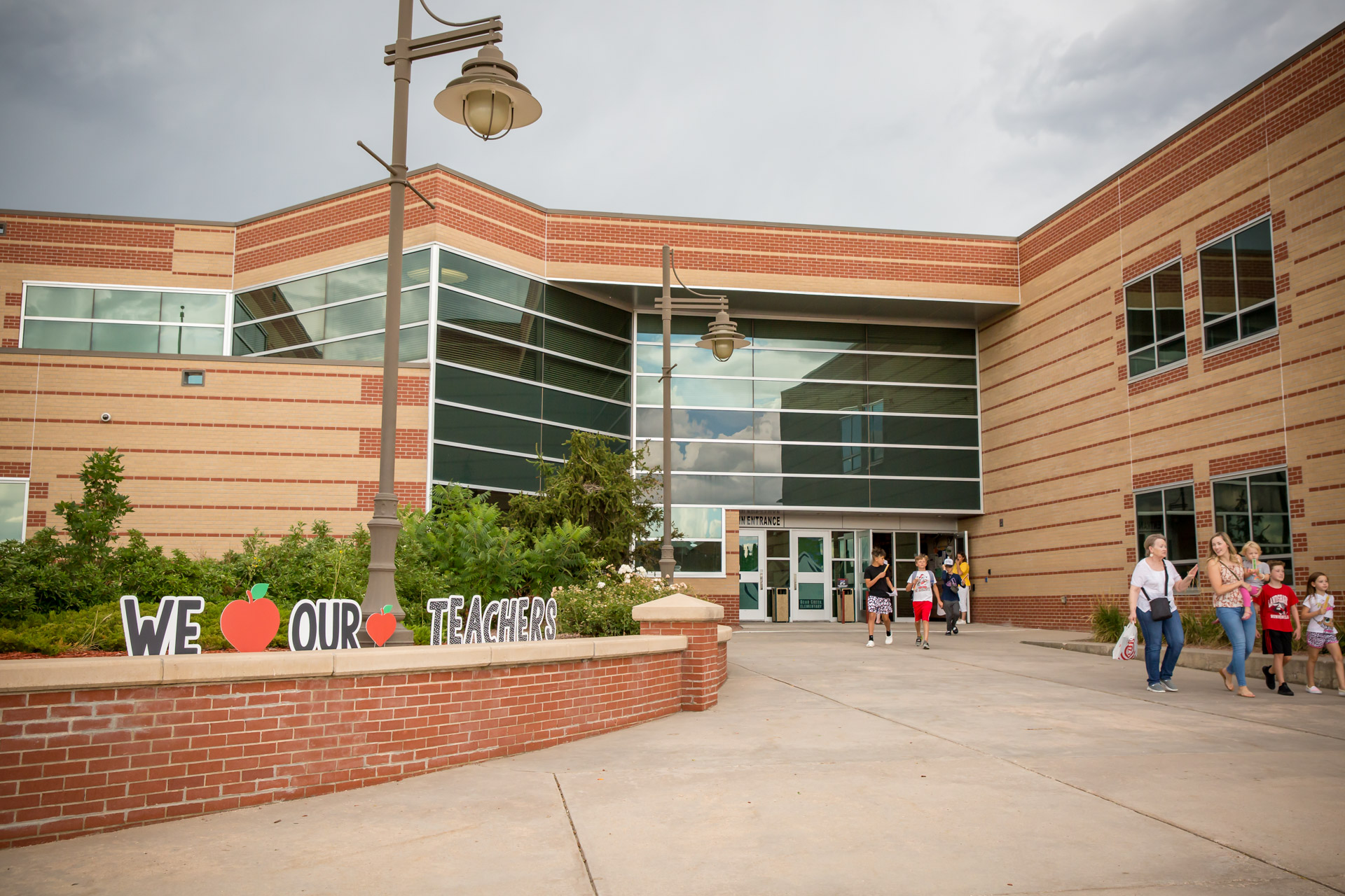 Families walk into BCES on the first day