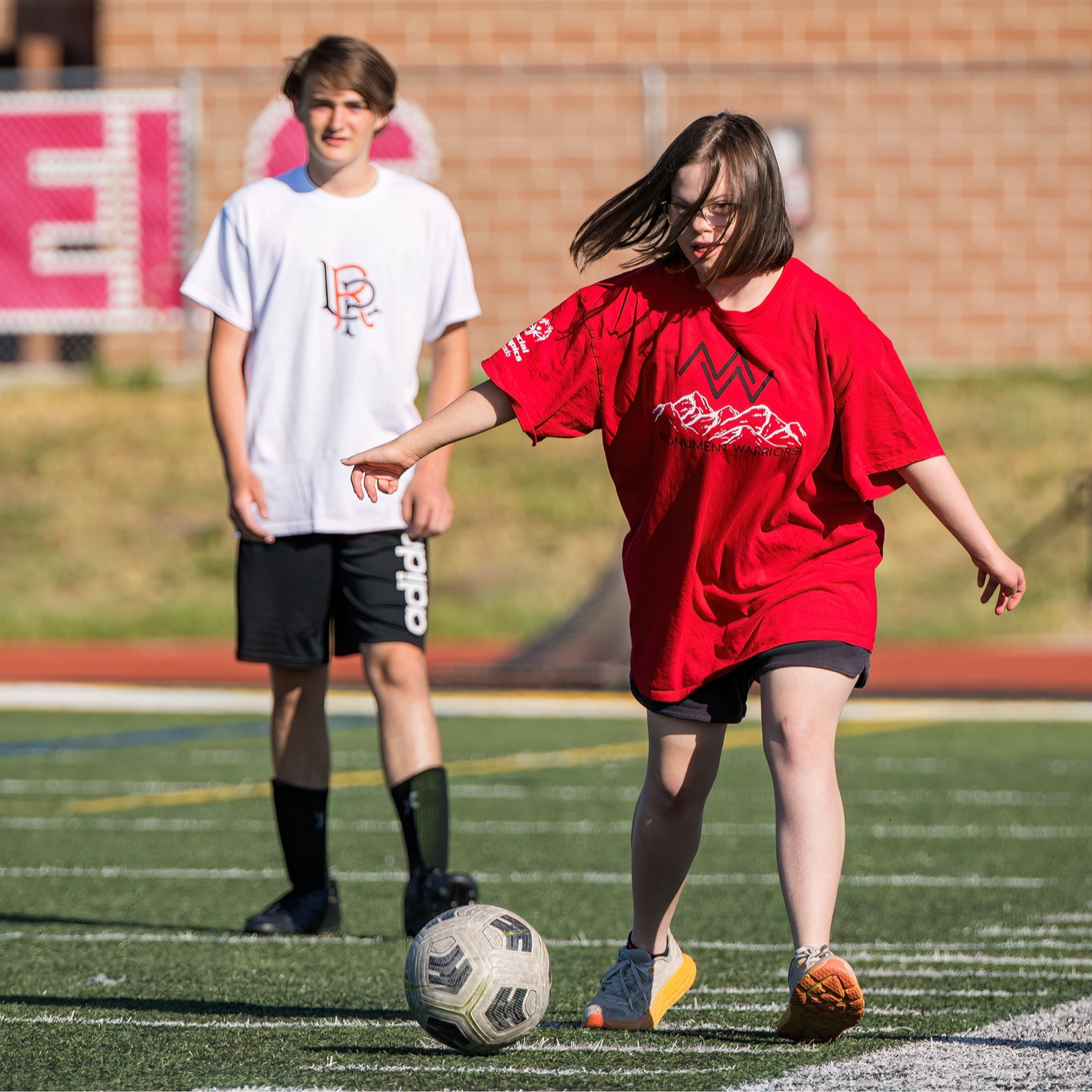 Student participates in a unified soccer game