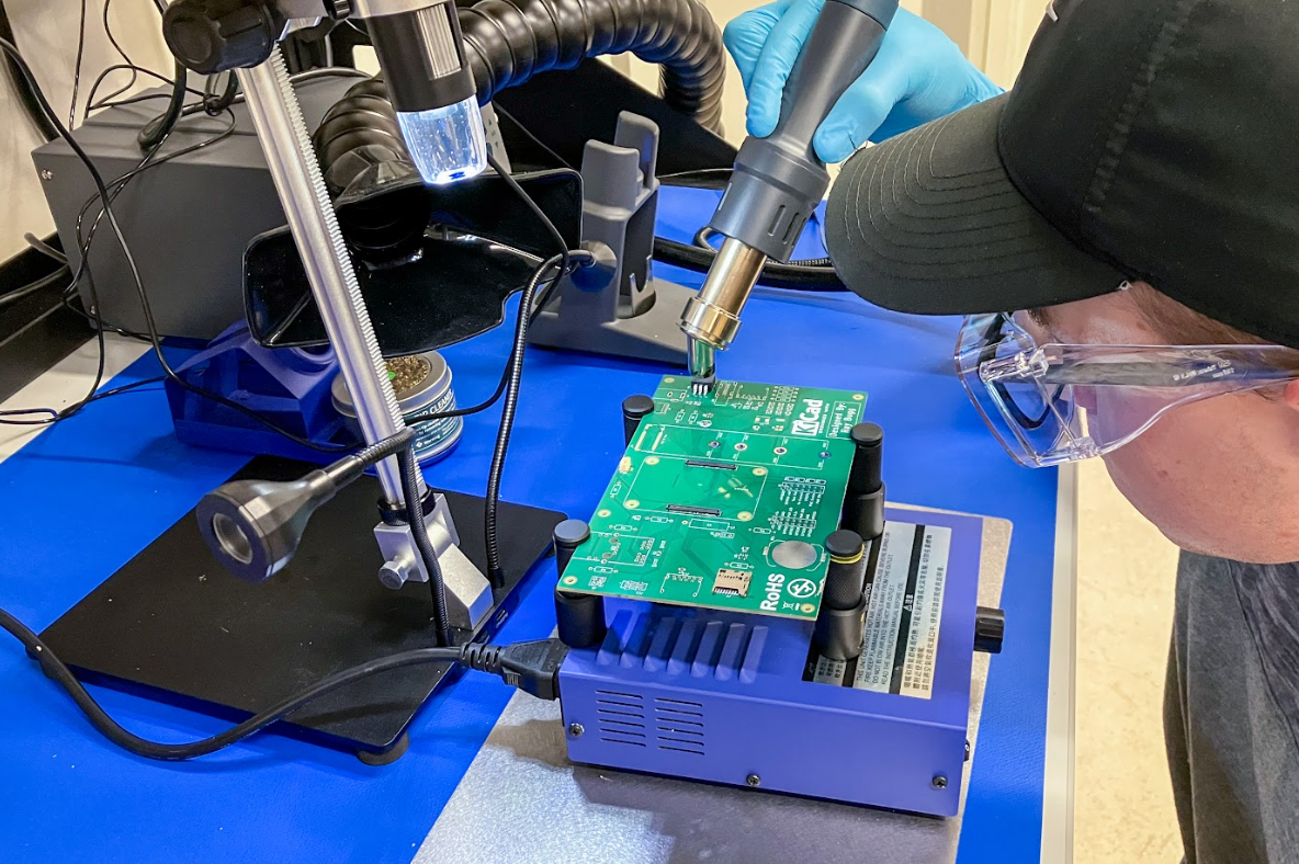 A student working on something electronic at the CIC