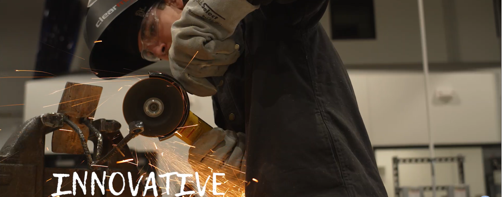 Innovative imposed over image of a male student welding