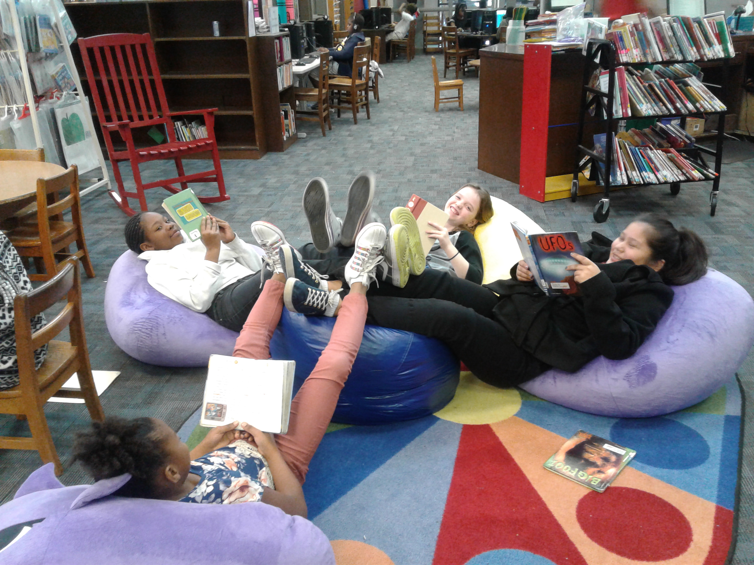 Photo of students reading in the library.