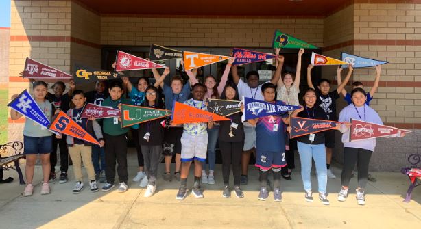 AVID class photo with college banners image
