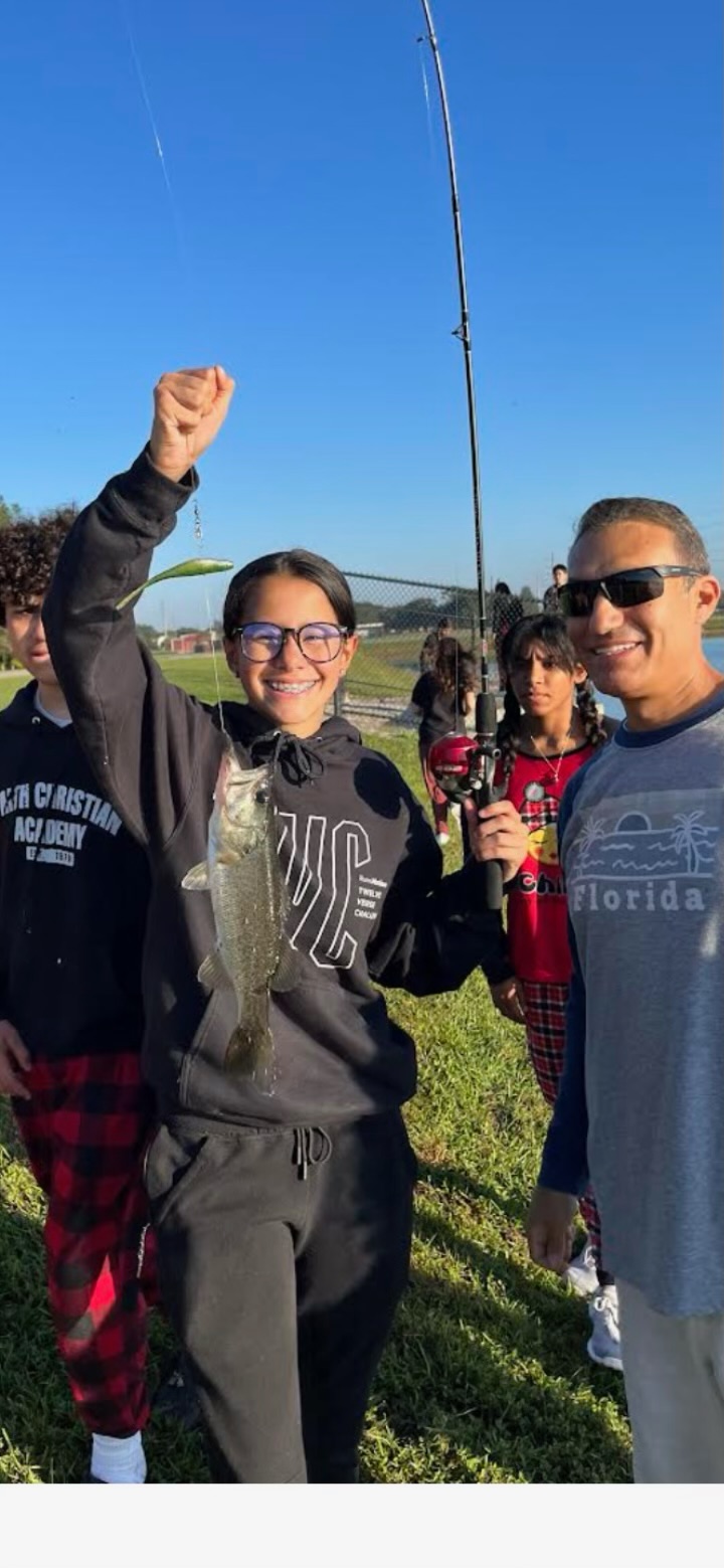Faith Christian Academy, fl- mr Jon contreras with students fishing