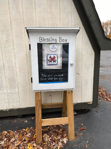Little pantry/blessing box behind High Street United Methodist Church's storage shed