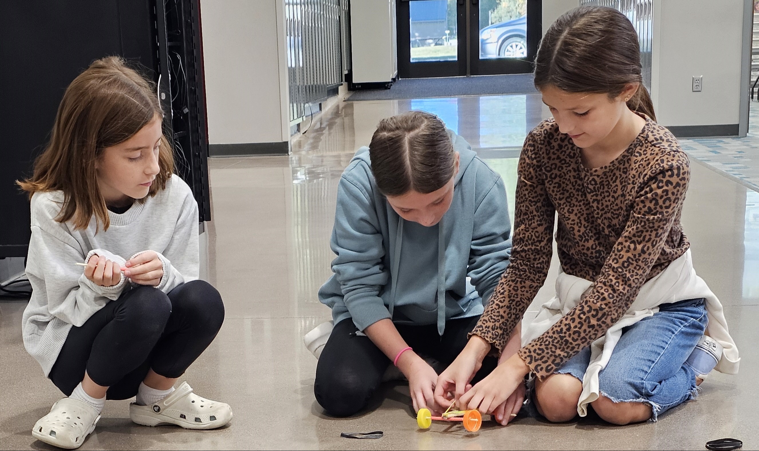 Middle School students working on a science project