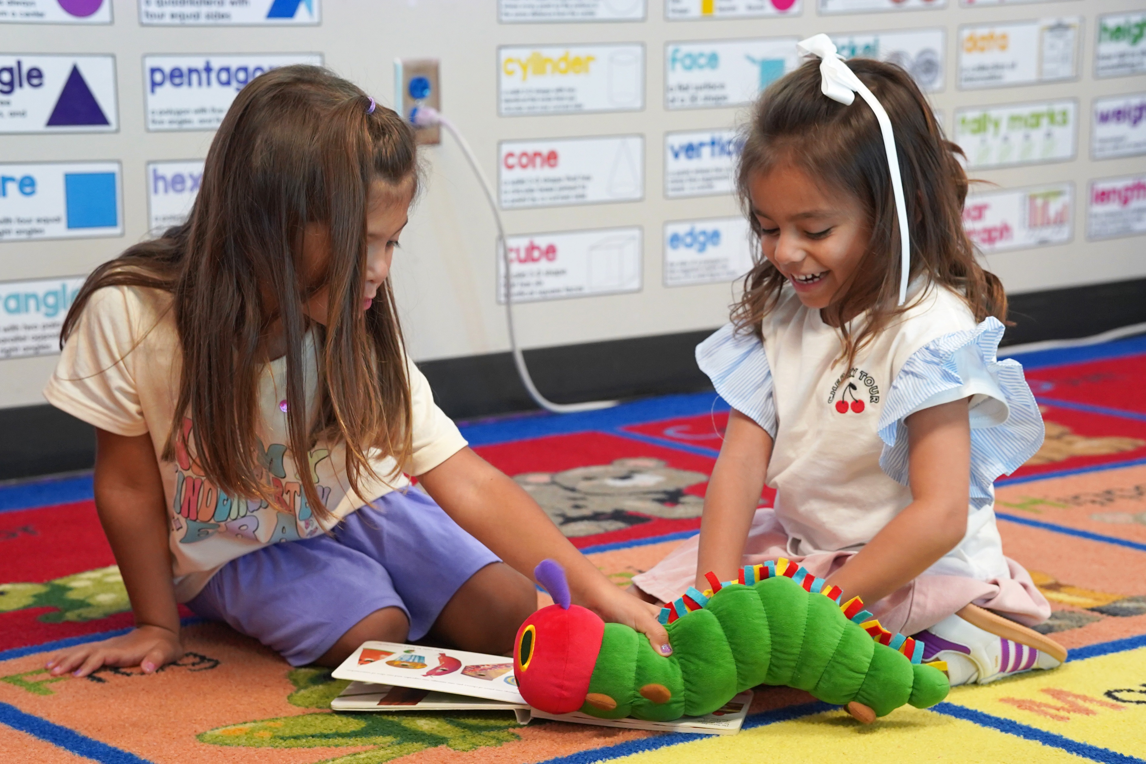 Young students reading together