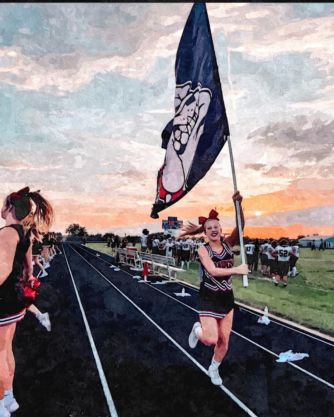 cheerleader running with a flag