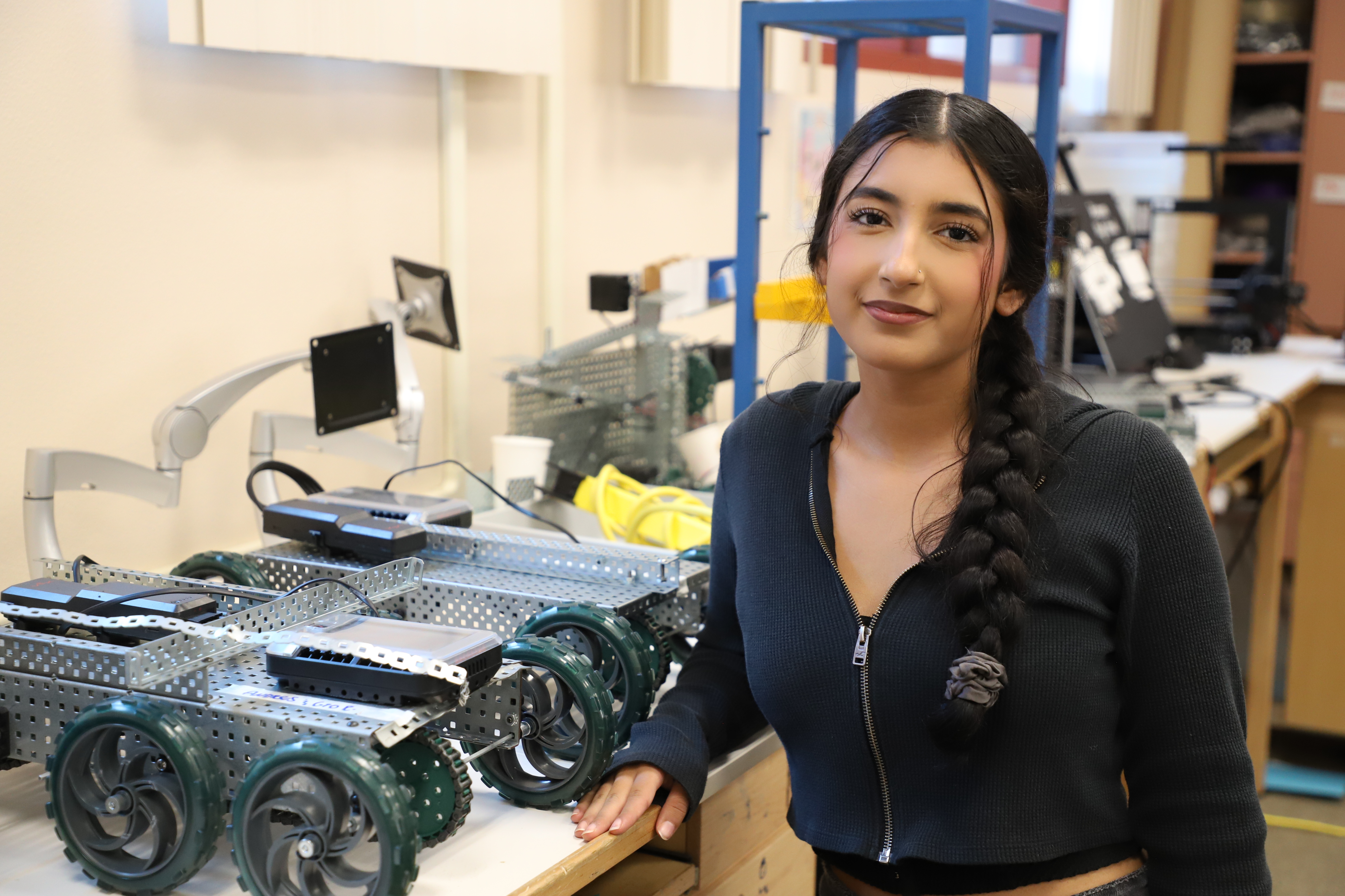 Engineering student works on robotic car