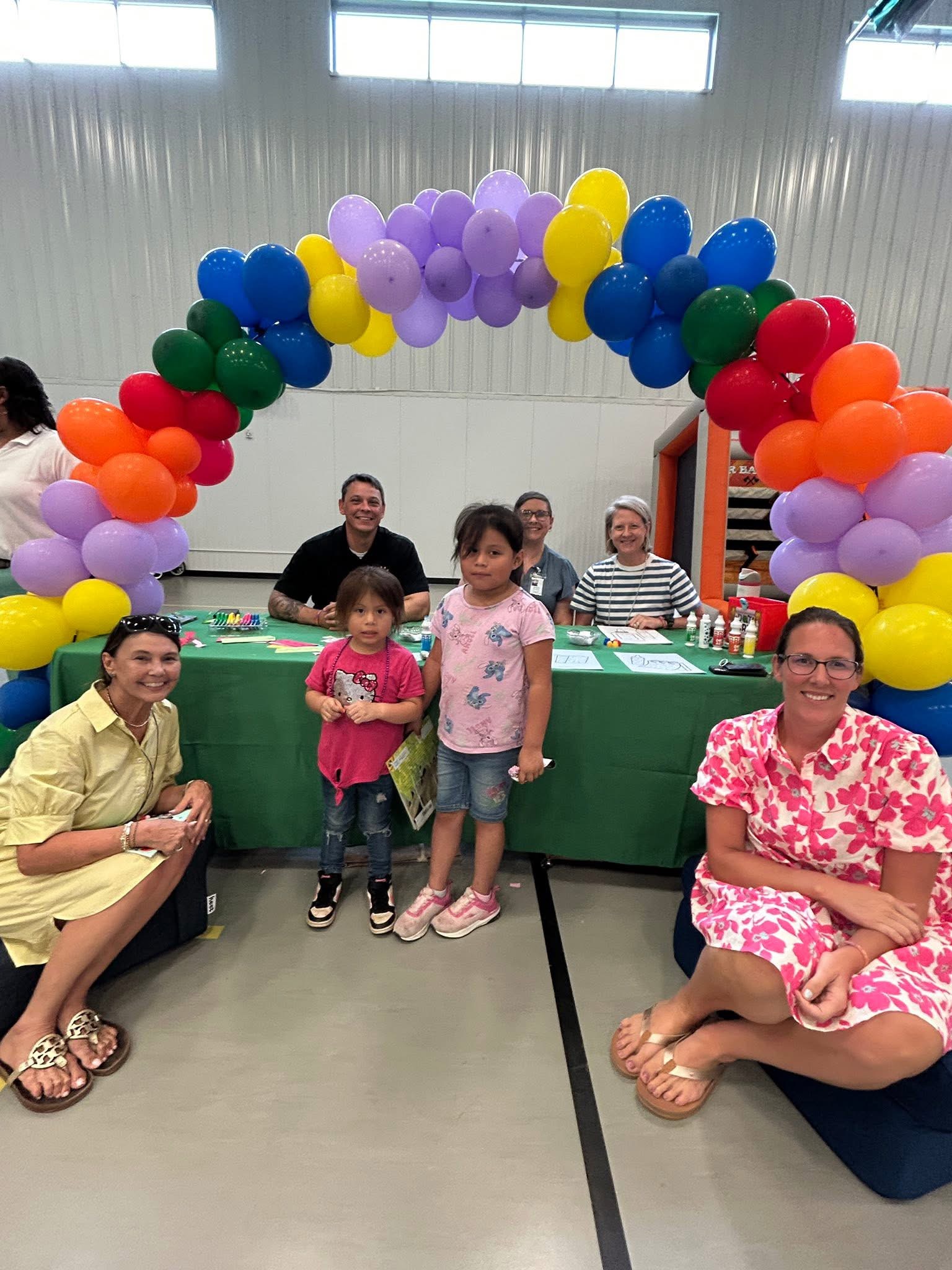 Picture of children and adults at a school event