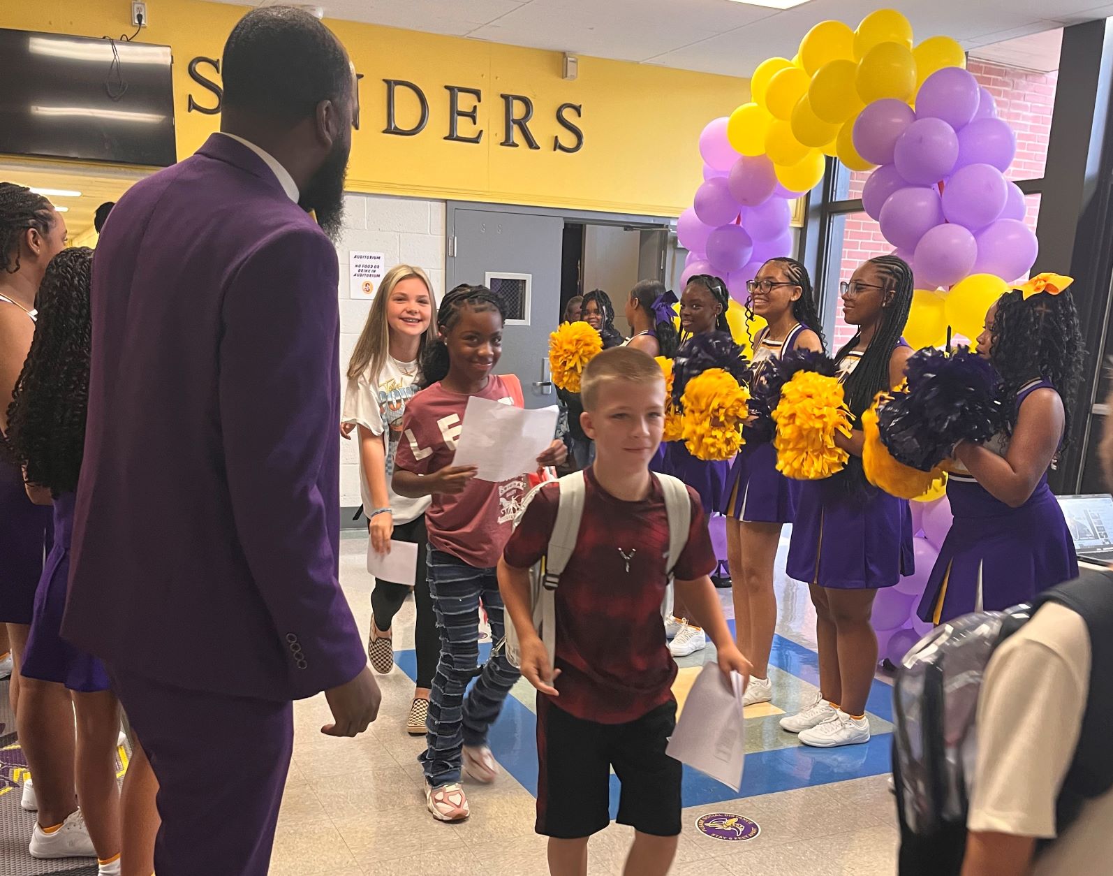 Students entering building on first day of school