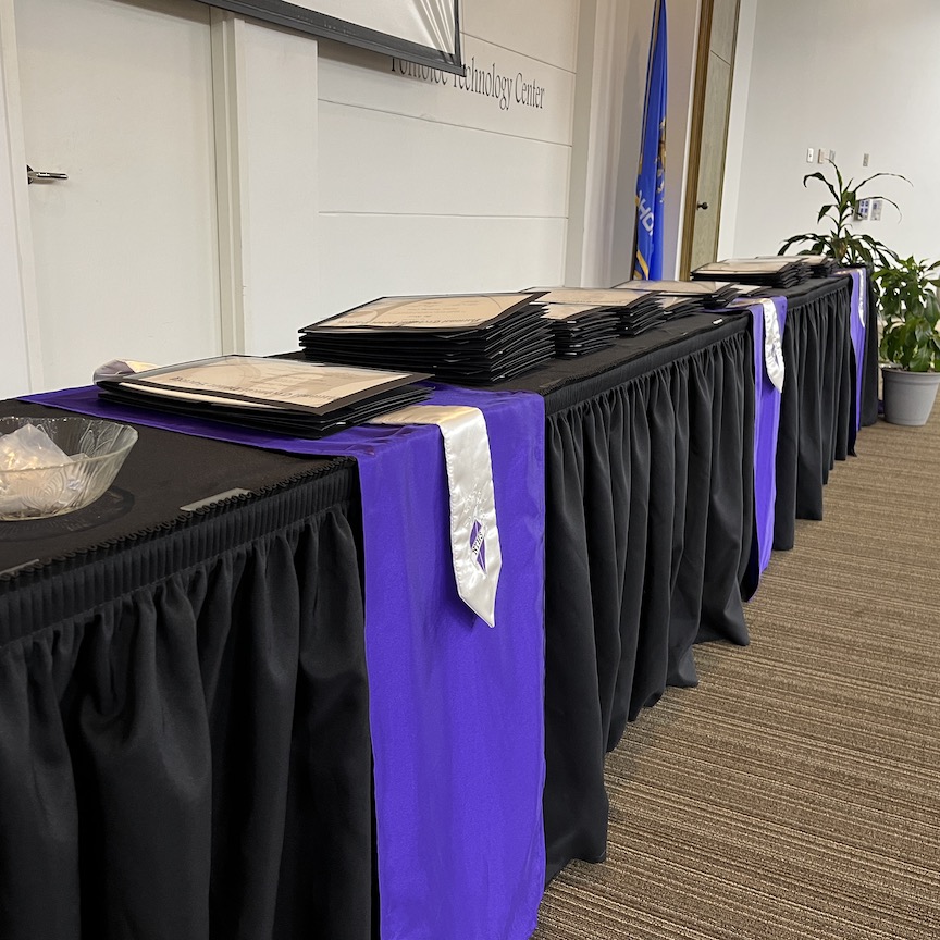 Table with awards laid out on it