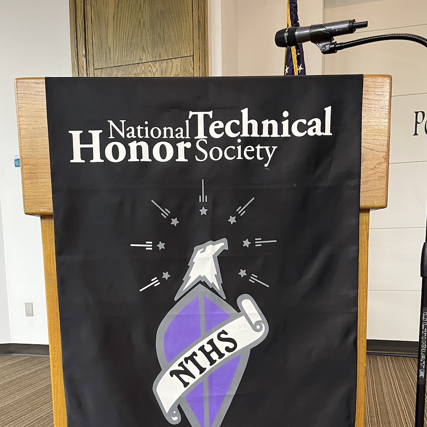 NTHS Logo flag on front of podium