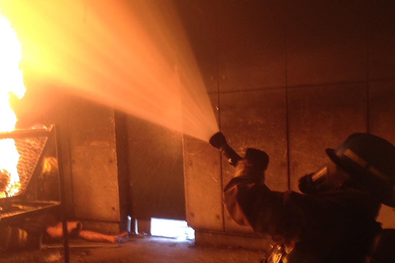 Firefighter putting out a fire