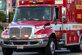 Ambulance driving down the road