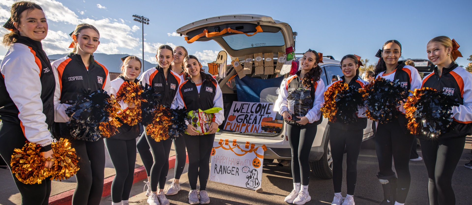 Harvest of love tiTrunk or treat cheerleader car