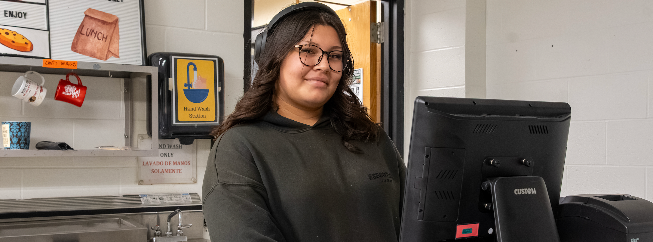 A student stands at the counter in the Eagle's Nest cafe