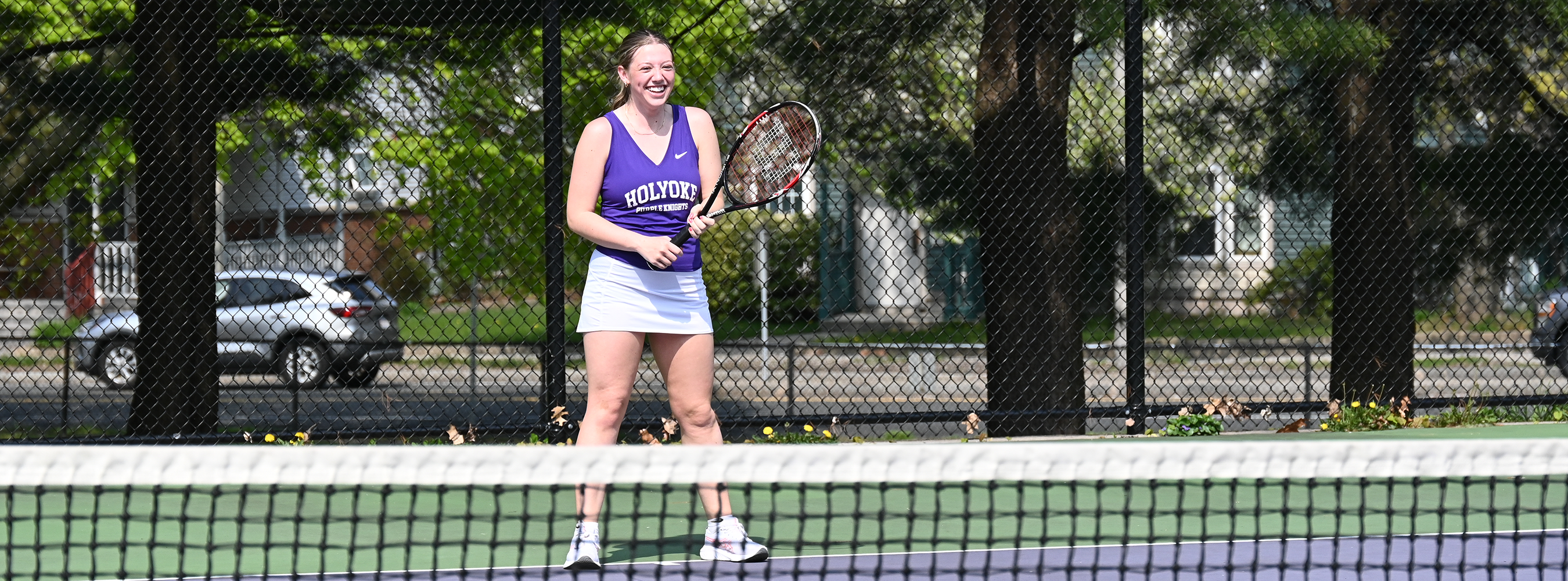 Tennis player outside in uniform