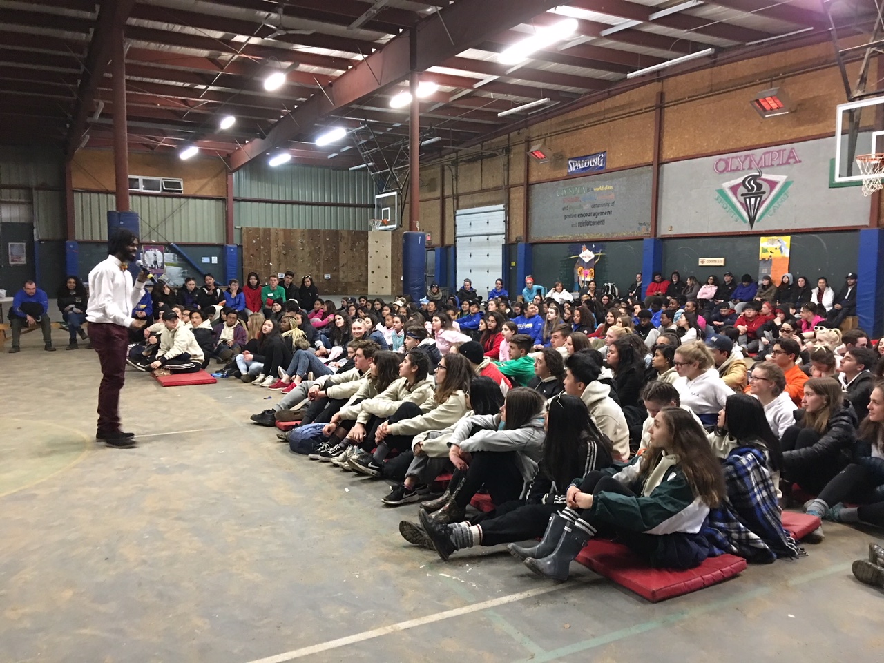 Students attending presentation at Camp Olympia