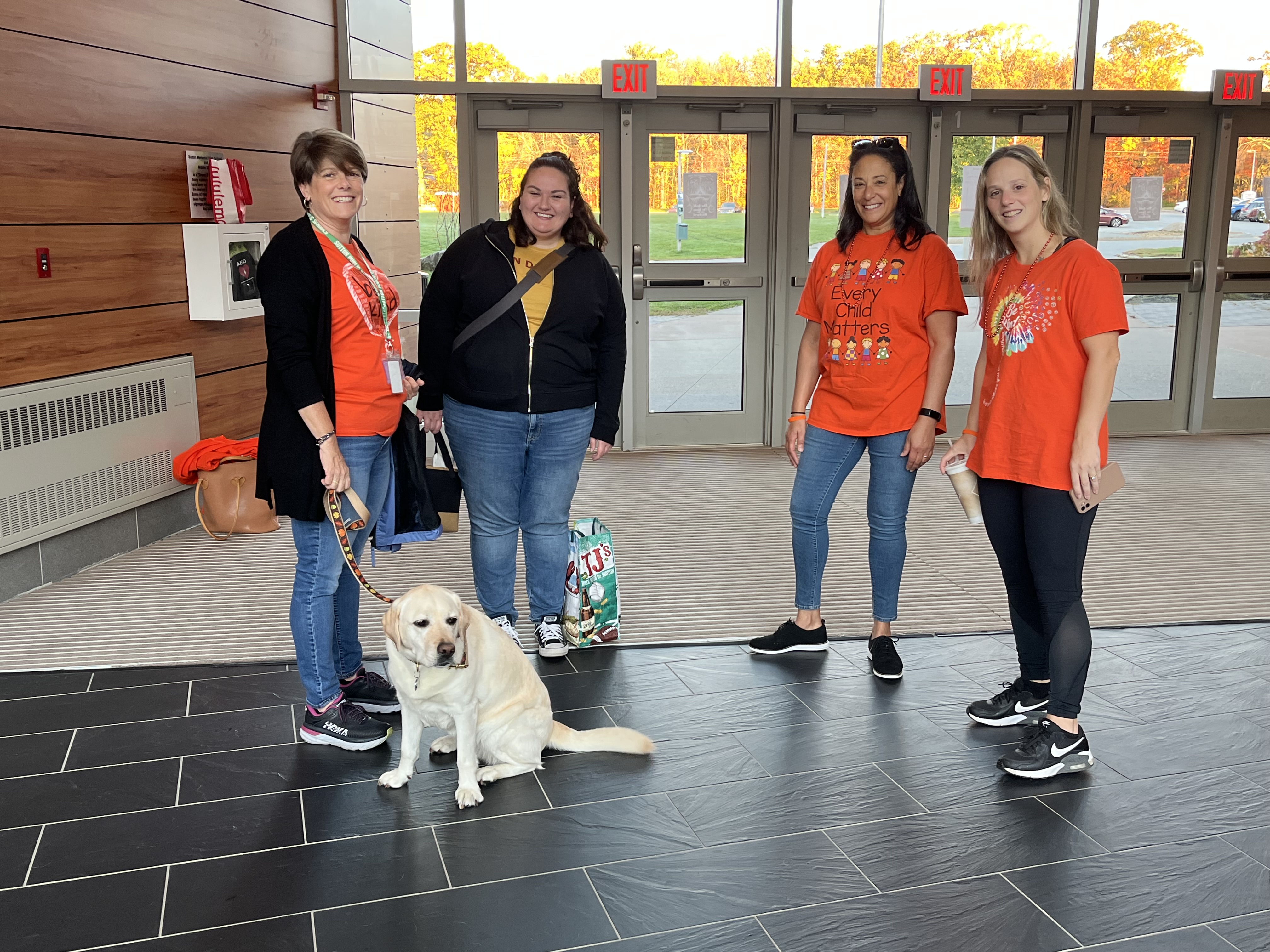 Staff w/dog celebrating Unity Day