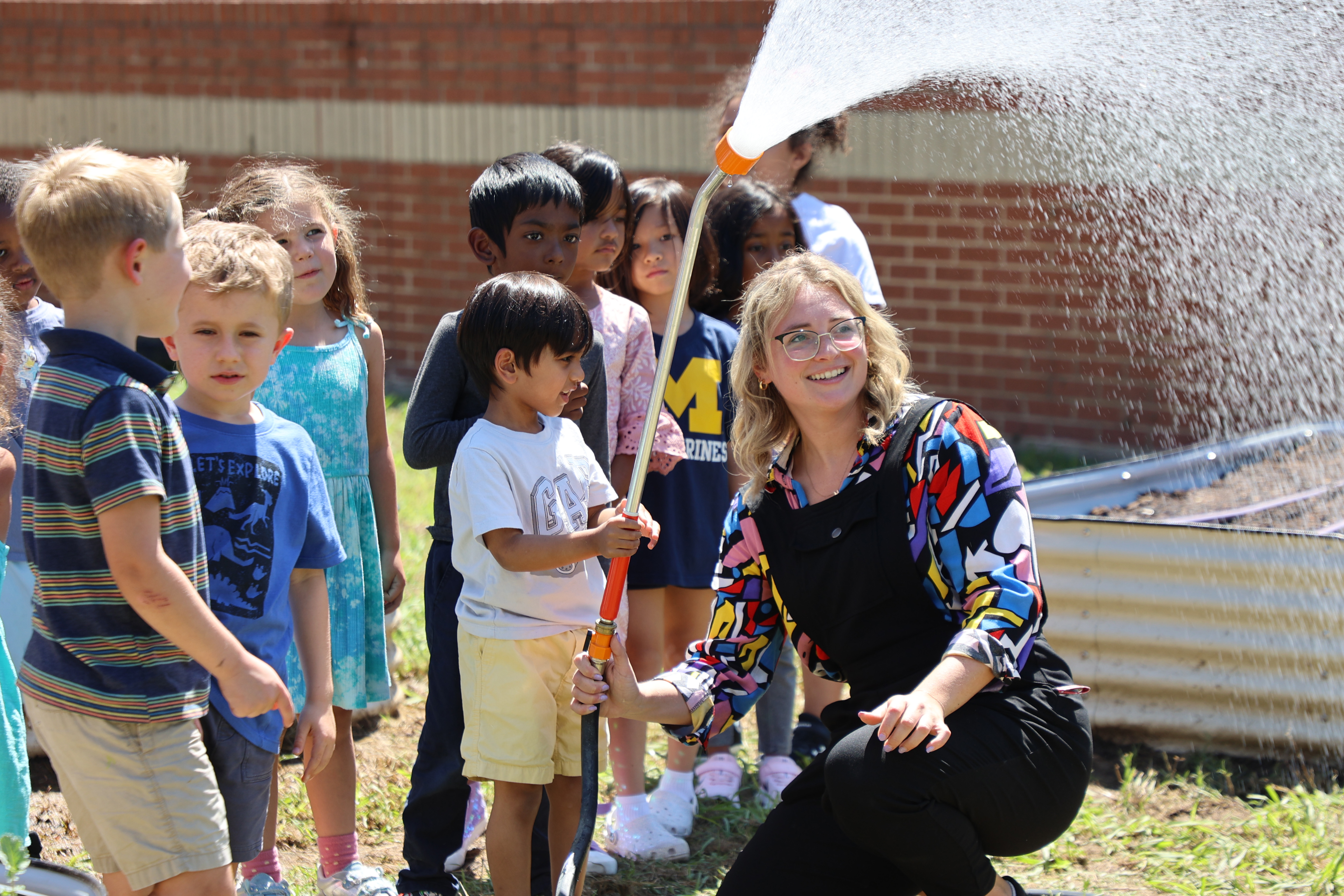 Town Center Elementary students working in garden