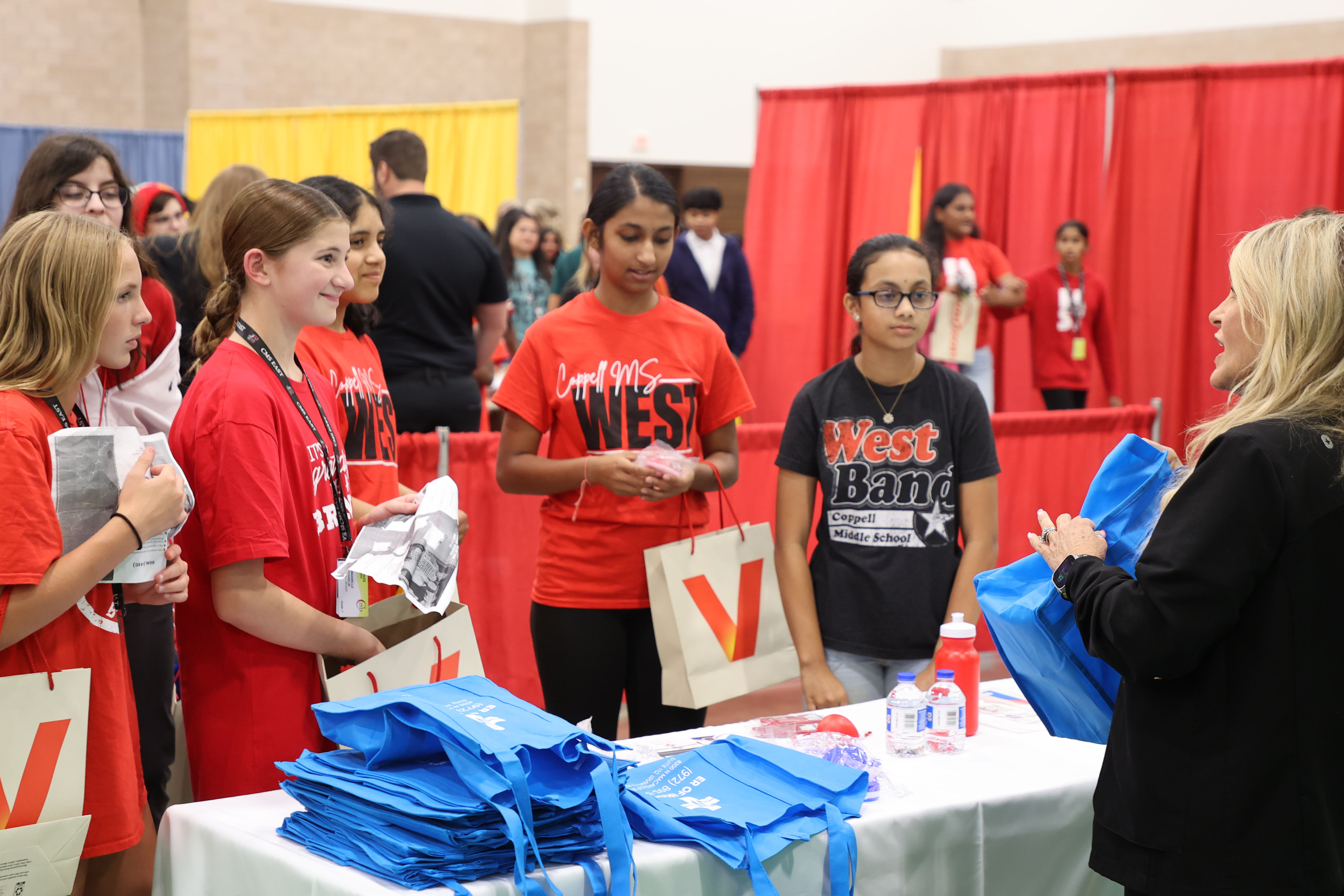 CMS. West students talking to vendors at Career Inspire