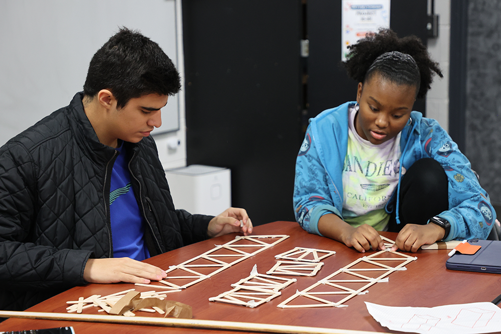 New Tech Students working a project together