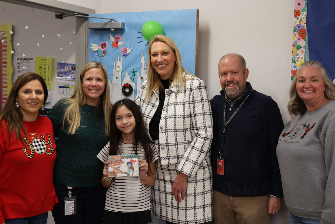 Holiday Card winner Sabrina Whitney with Dr. Shivers, Mr. Miller, Ms. Sweeney, Ms. Quinonez, and Ms. Howard