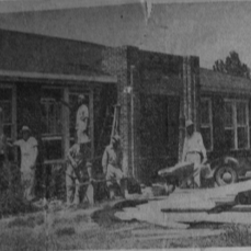 The building was rebuilt using the original concrete foundation and brick walls for $21,000 and looked almost exactly the same