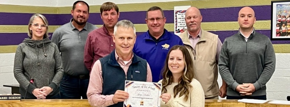 Photo. Dalhart school board recognized Lacey Bolton as the DIS Teacher of the Month, pictured here with Chad Blain, DIS Principal, and board members Joni Atha, Reynaldo Encinias, Jared Gordon, President Bob Bailey, Superintendent Jeff Byrd and Eric Diaz.