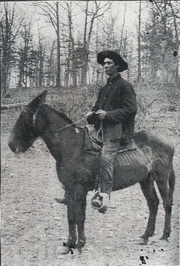 Old picture of a person in a horse