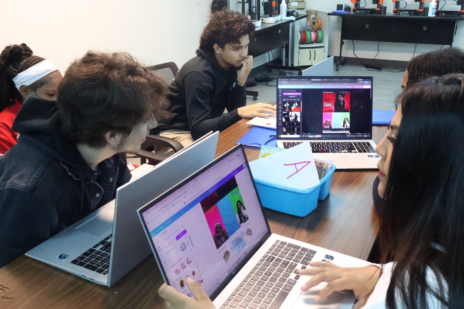 Multimedia students giving feedback on a design