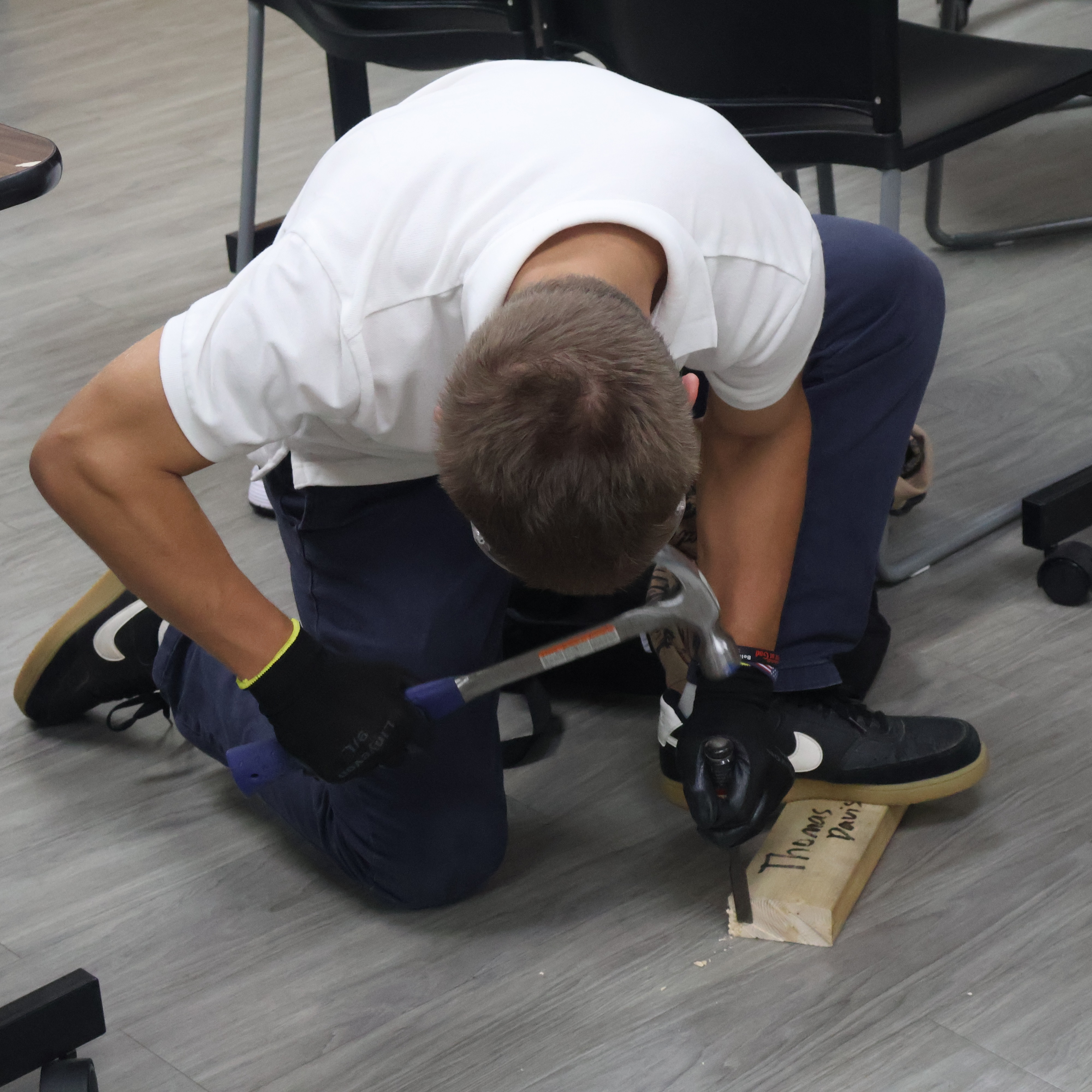 Electrical Student using Hand Tools