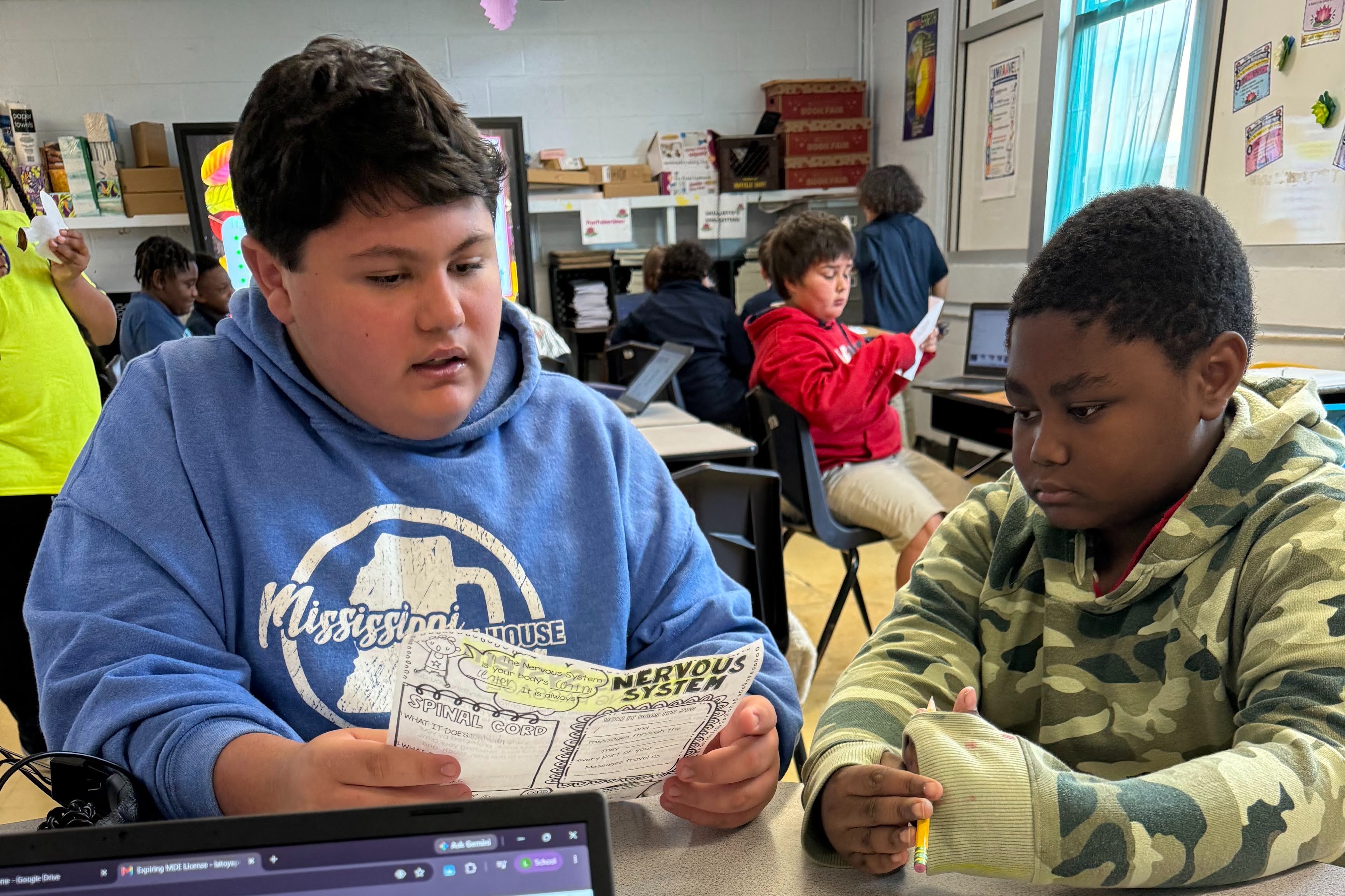 Educator Prep student working with a student