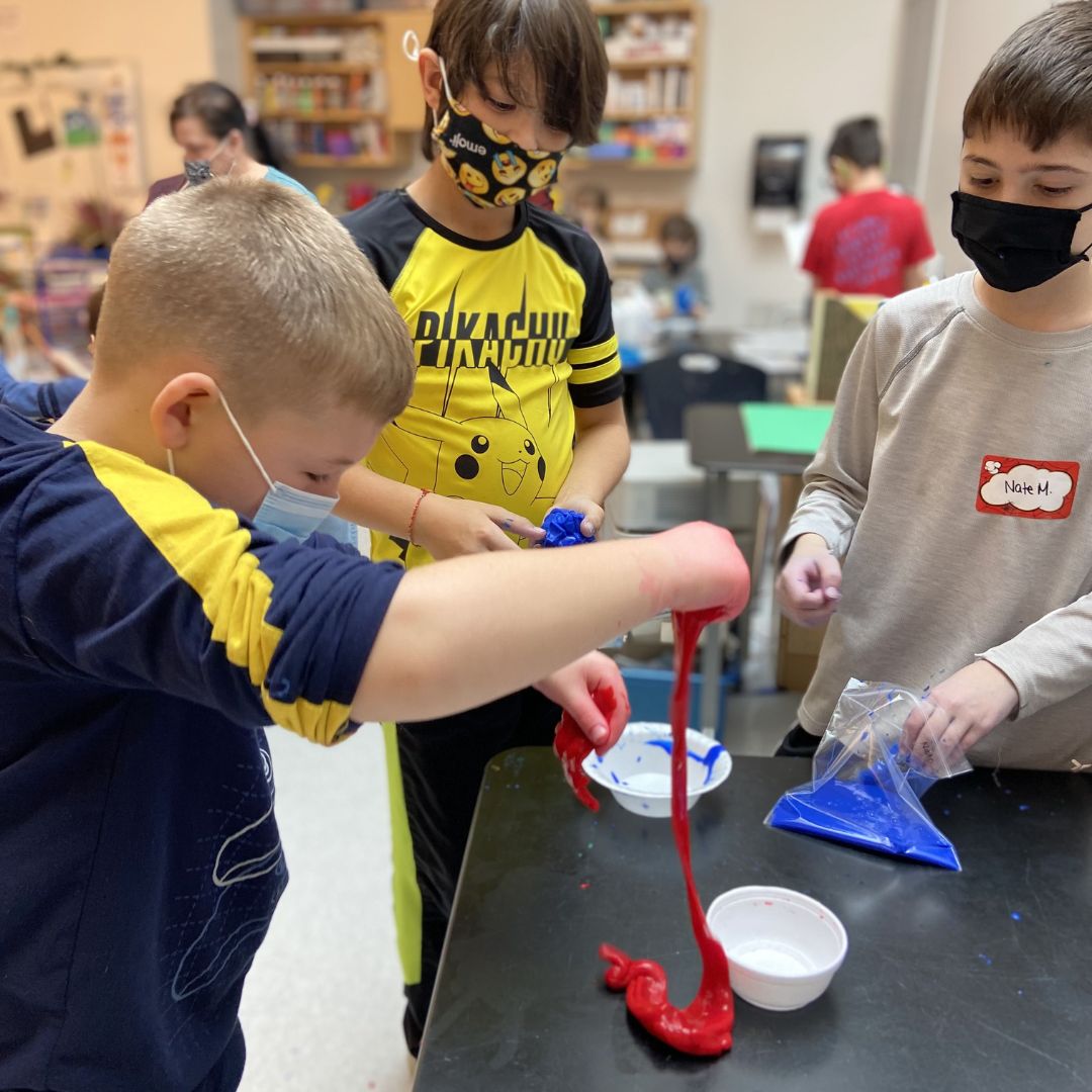 Students playing with slime