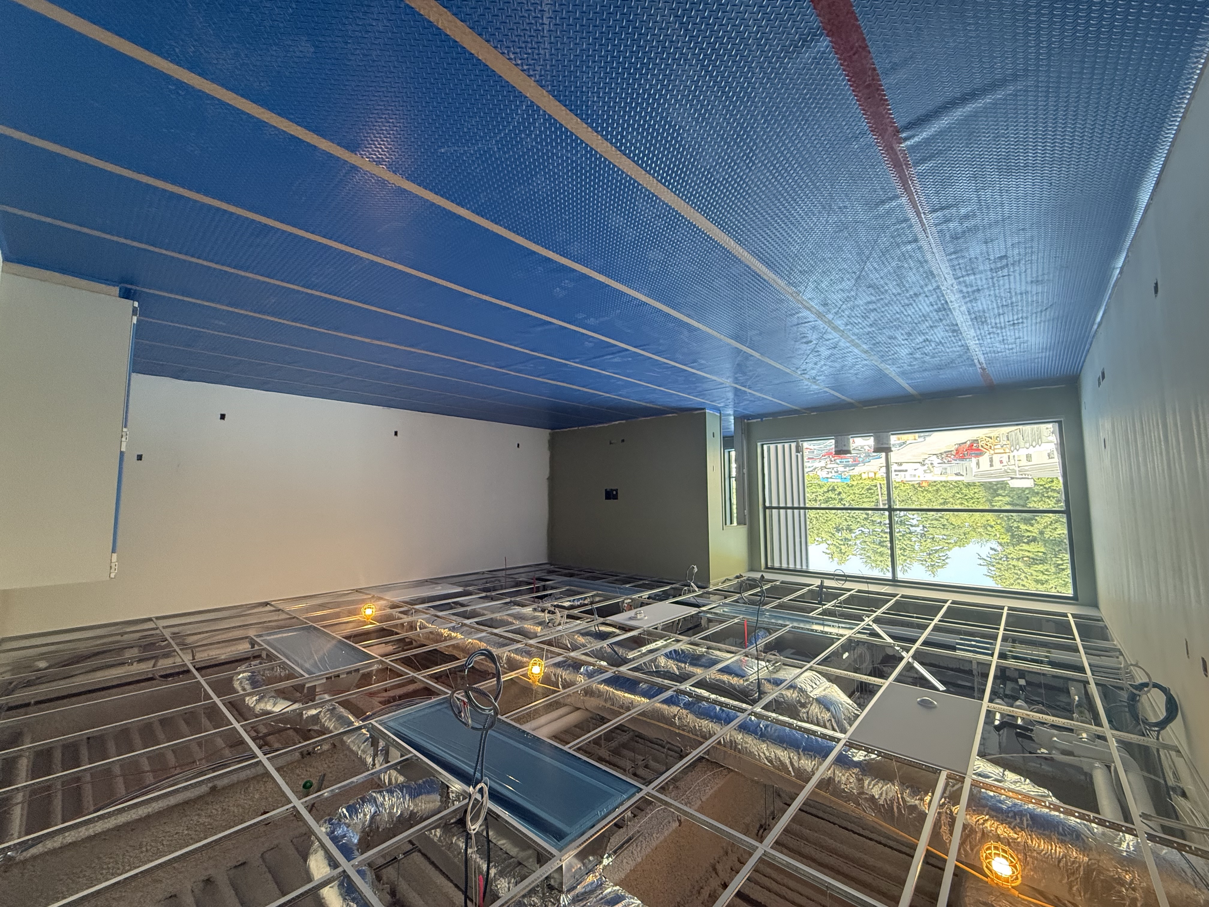 Blue coverings line the floor of the new NRHS classroom.