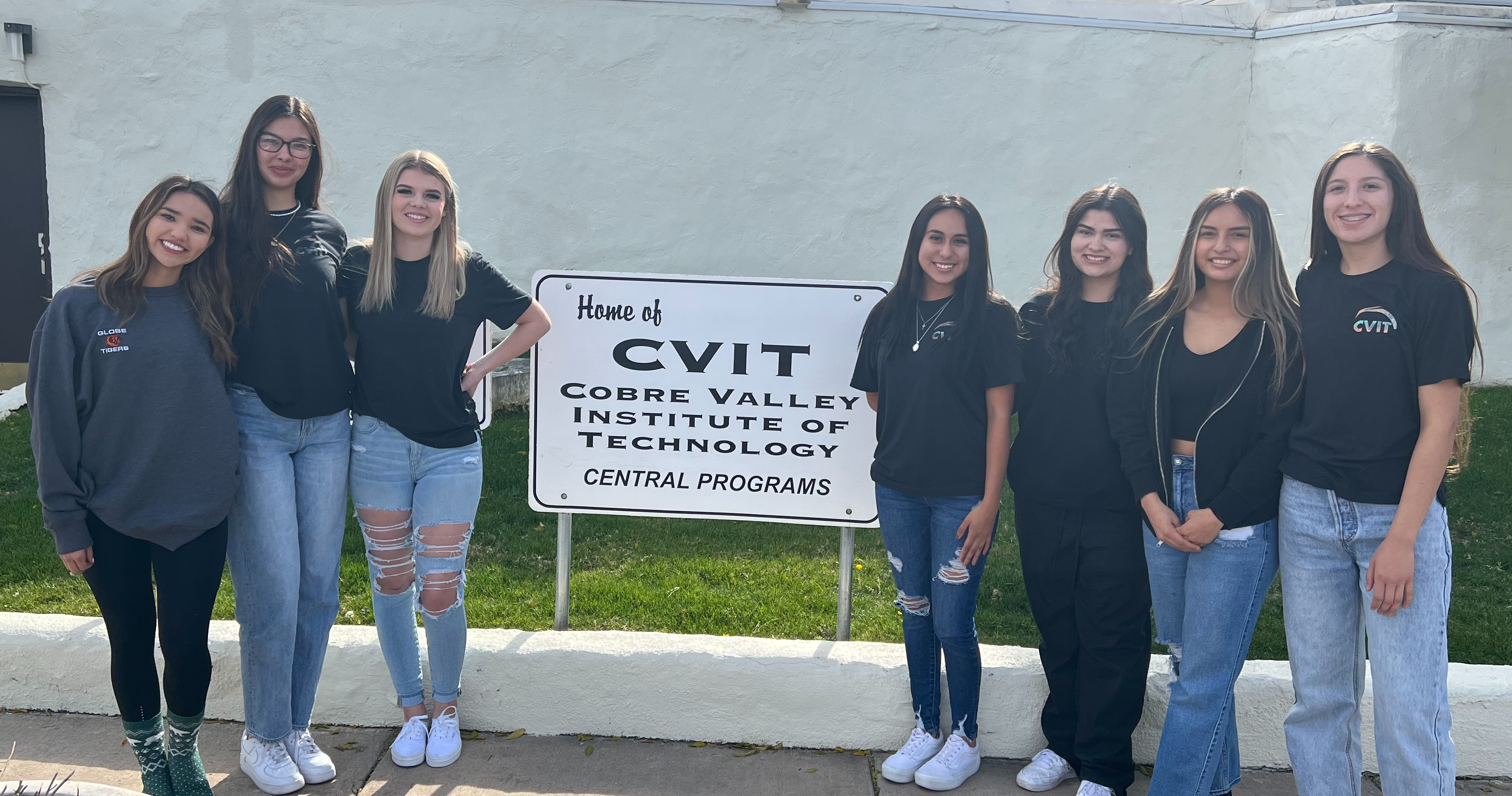 2nd year Medical Assistant students standing by CVIT sign