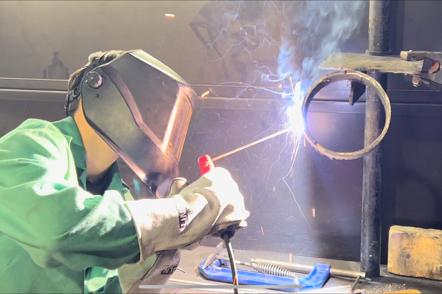 Student practicing pipe welding