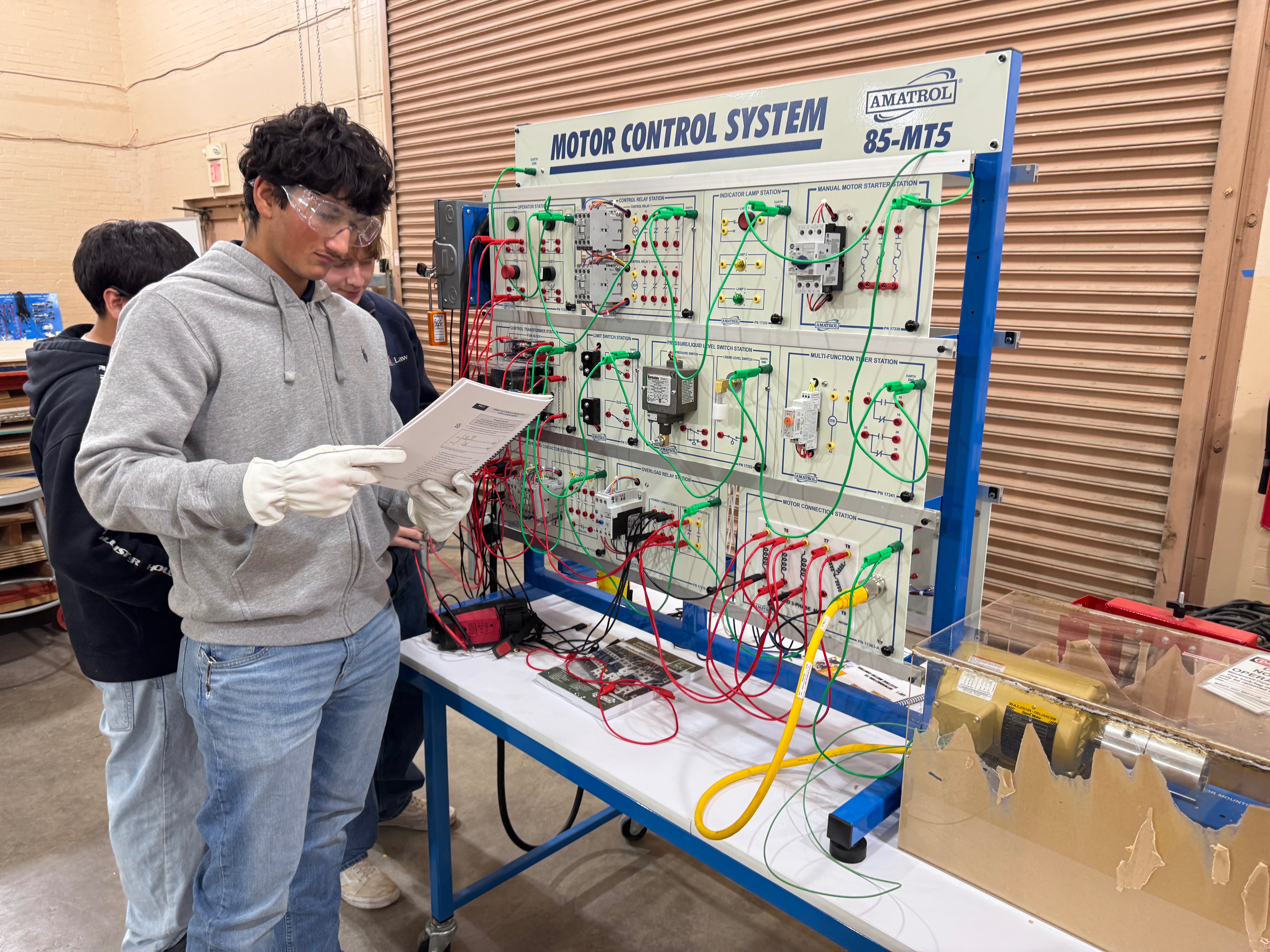 Electrician walking away from work vehicle
