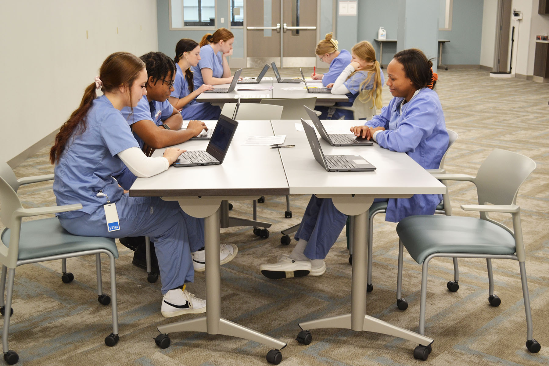 Nursing students taking a test at Polaris Career Center