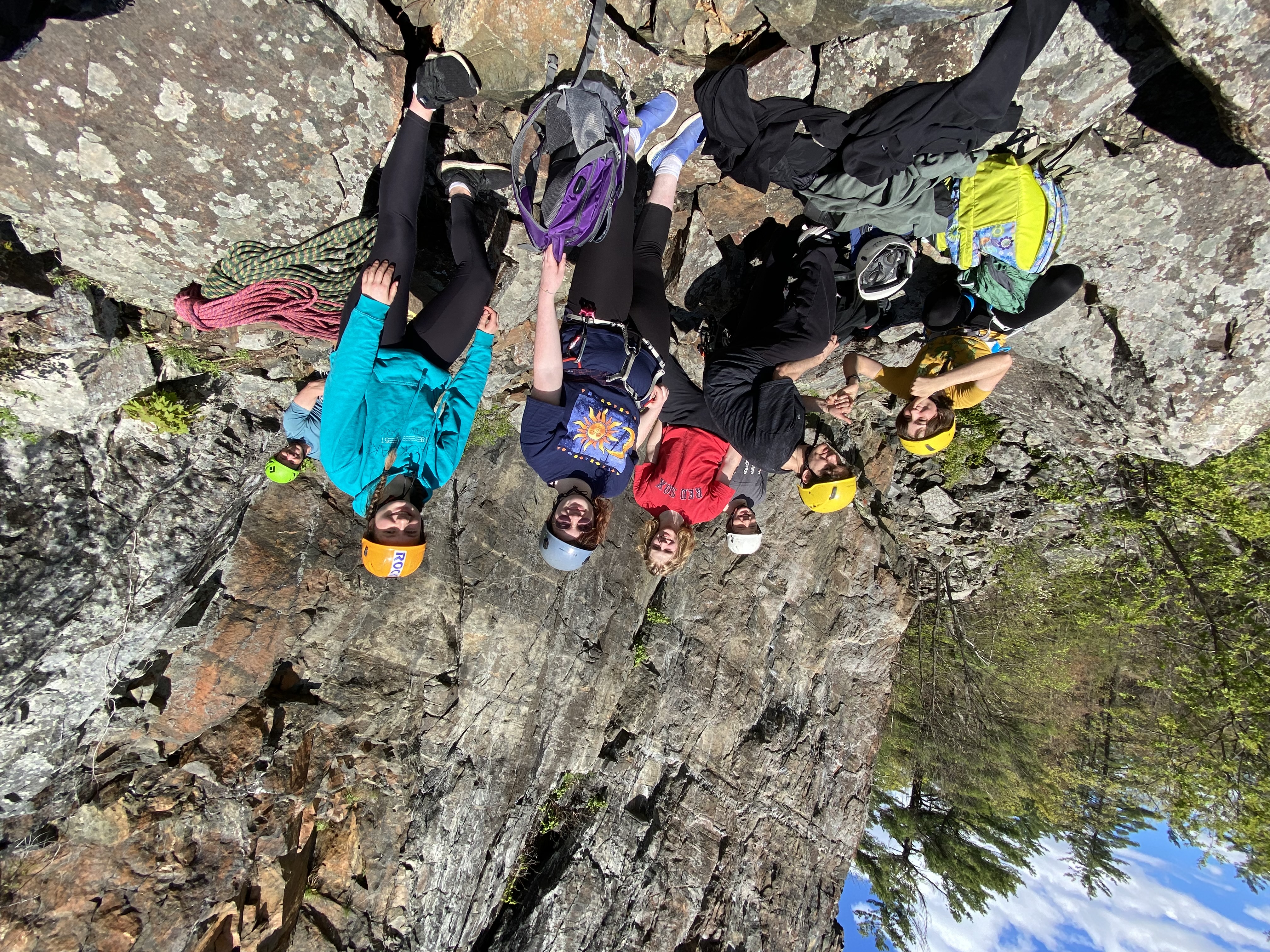 Members of the climbing club stand near Shelving Rock in Fort Ann