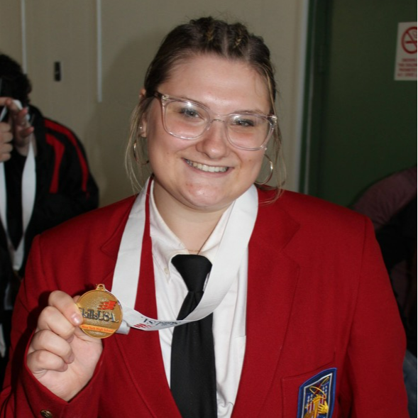 Maddalena Spada holds her gold medal