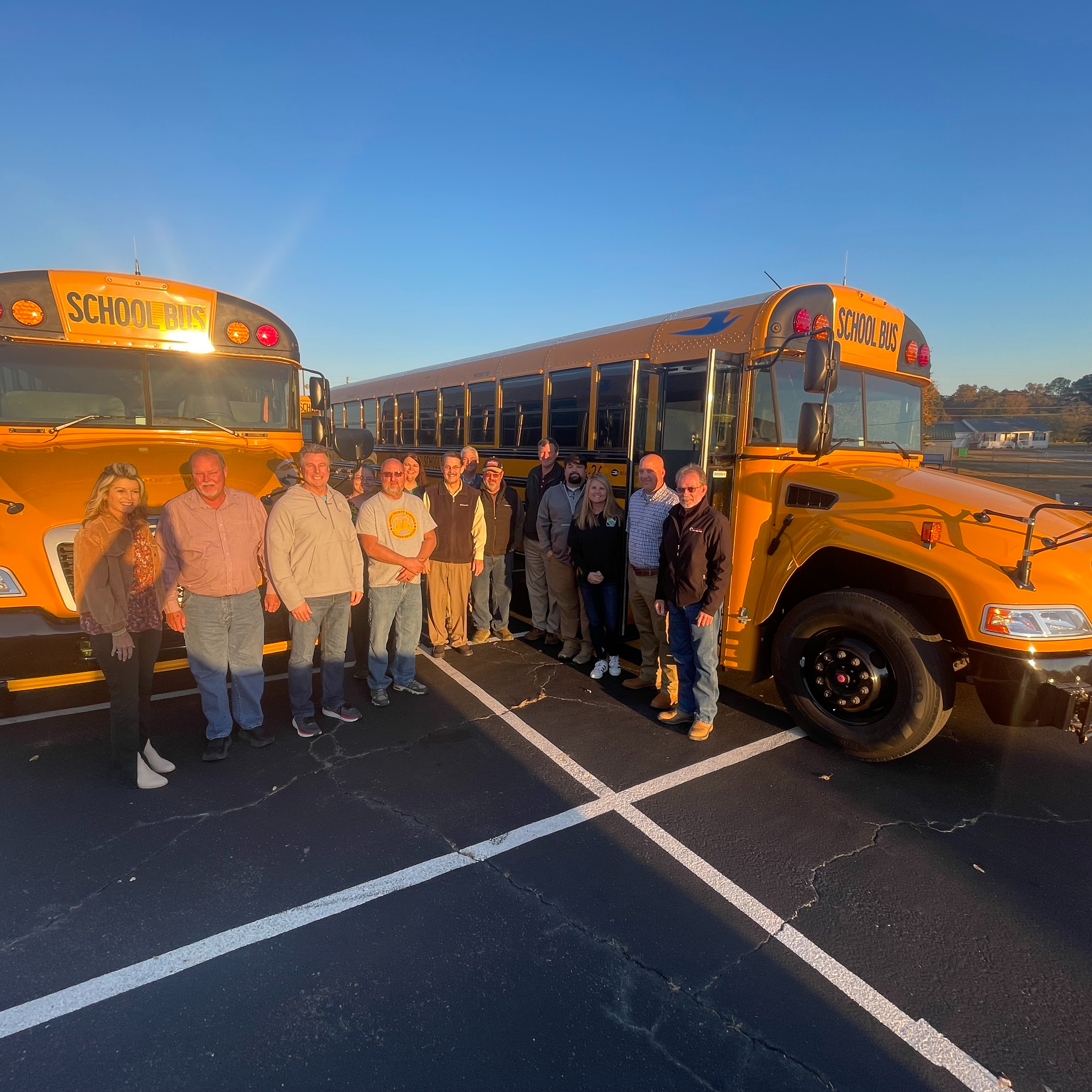 boe members and new buses