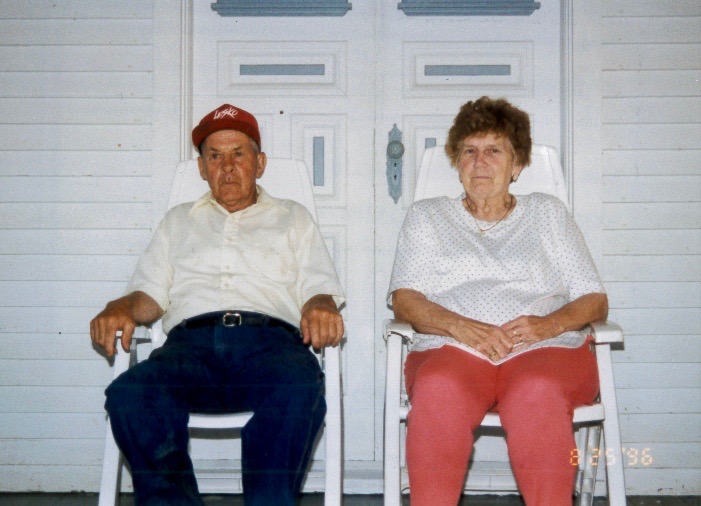 Neil and June Shaner sitting in two rocking chairs
